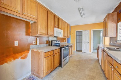 Three-bedroom, two-bath home situated on approximately 0.5 acres - photo 6