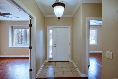 Desirable and beautifully maintained one-level townhome in