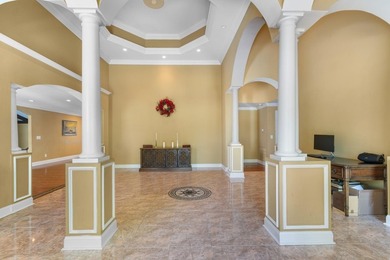 Tucked inside the sought-after golf course community of Coastal - photo 3