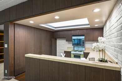 Elevated living along the Truckee River 4th-floor condo offering - photo 9