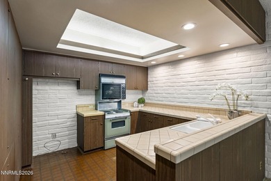 Elevated living along the Truckee River 4th-floor condo offering - photo 10