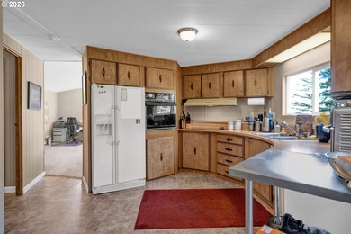 This residence offers expansive views of the Umpqua River - photo 12