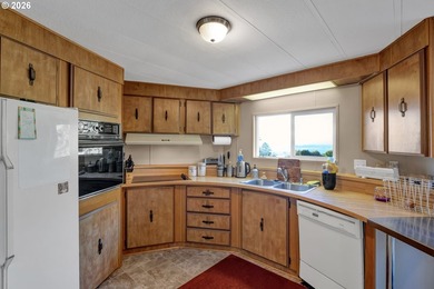 This residence offers expansive views of the Umpqua River - photo 13