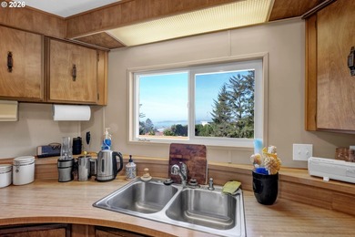 This residence offers expansive views of the Umpqua River - photo 14