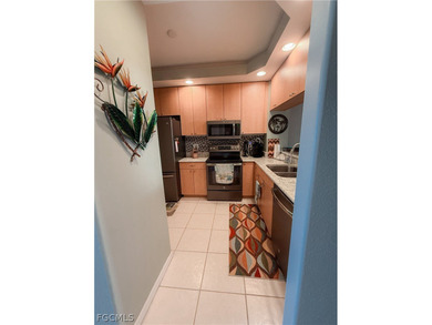 This fabulously well maintained gated community is located by - photo 3