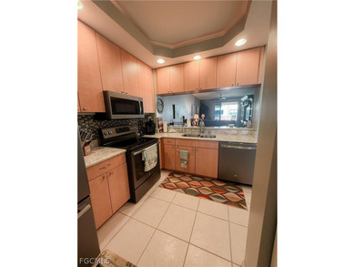 This fabulously well maintained gated community is located by - photo 4