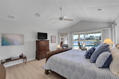 Beautifully remodeled pool home with stunning lake and golf