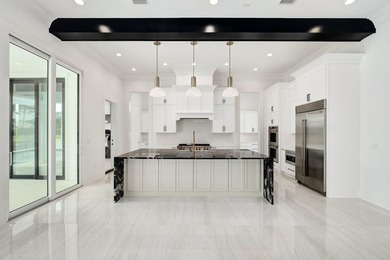 Located within the elevated Regatta Bay Golf & Yacht Club, this - photo 12