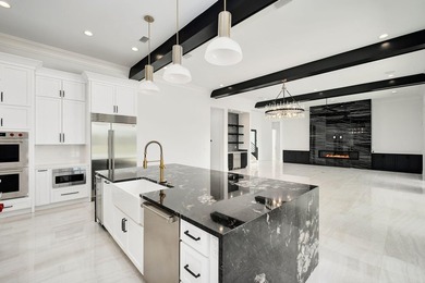 Located within the elevated Regatta Bay Golf & Yacht Club, this - photo 13