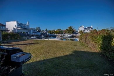 Waterfront Living Near Fire Island Shores Welcome to your serene - photo 14