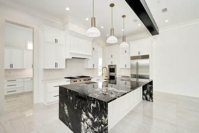 Located within the elevated Regatta Bay Golf & Yacht Club, this - photo 15