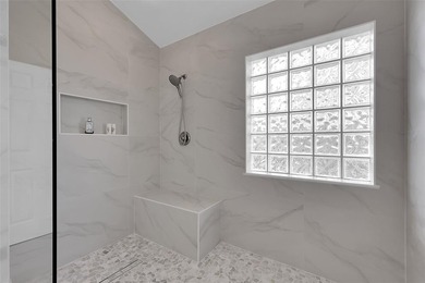 Beautifully remodeled pool home with stunning lake and golf