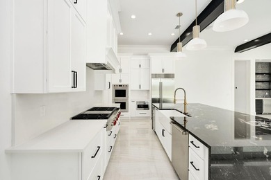 Located within the elevated Regatta Bay Golf & Yacht Club, this - photo 16
