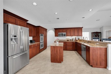 Beautifully remodeled pool home with stunning lake and golf