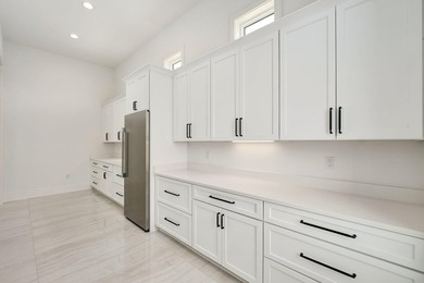 Located within the elevated Regatta Bay Golf & Yacht Club, this - photo 17