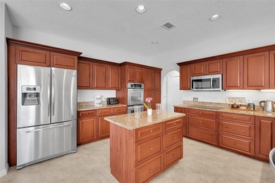 Beautifully remodeled pool home with stunning lake and golf