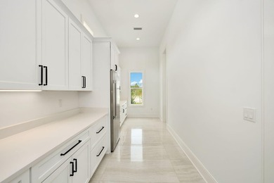Located within the elevated Regatta Bay Golf & Yacht Club, this - photo 18