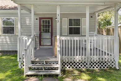 This charming Buchanan ranch has 2 bedrooms, 1 bathroom, and a - photo 18