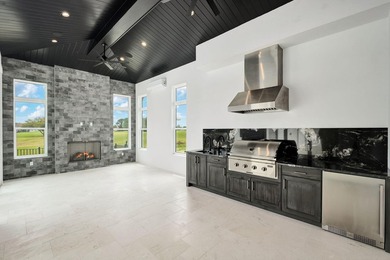 Located within the elevated Regatta Bay Golf & Yacht Club, this - photo 19