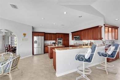 Beautifully remodeled pool home with stunning lake and golf