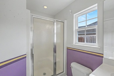 Nestled on a prime corner lot with serene pond views, this - photo 21