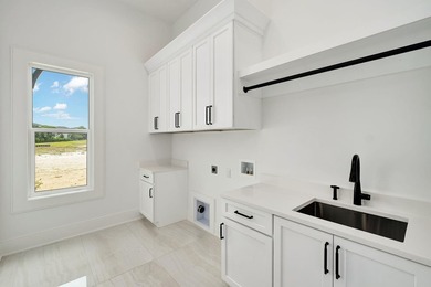 Located within the elevated Regatta Bay Golf & Yacht Club, this - photo 21