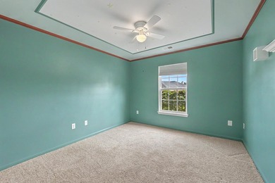 Nestled on a prime corner lot with serene pond views, this - photo 23