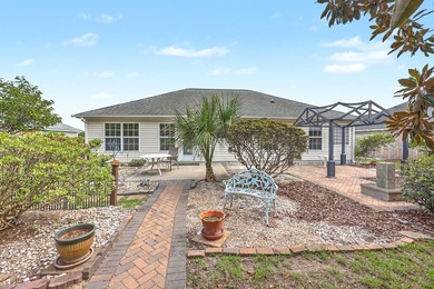 Nestled on a prime corner lot with serene pond views, this - photo 28