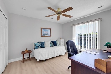 Beautifully remodeled pool home with stunning lake and golf