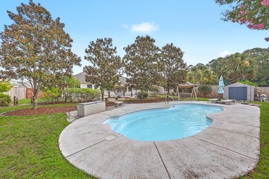 Nestled on a prime corner lot with serene pond views, this - photo 30