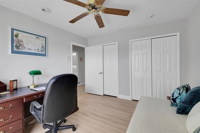 Beautifully remodeled pool home with stunning lake and golf