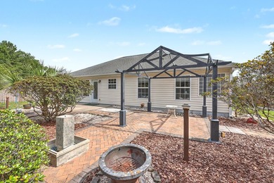 Nestled on a prime corner lot with serene pond views, this - photo 36