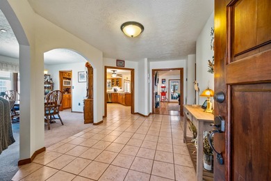 Back on the market with some improvements! This all-brick home - photo 3