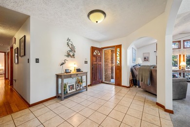 Back on the market with some improvements! This all-brick home - photo 4