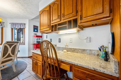 Back on the market with some improvements! This all-brick home - photo 7