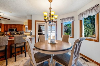 Back on the market with some improvements! This all-brick home - photo 8