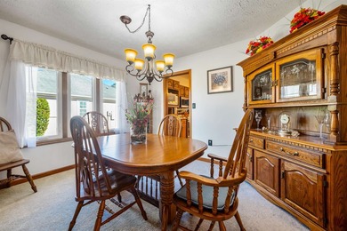 Back on the market with some improvements! This all-brick home - photo 9