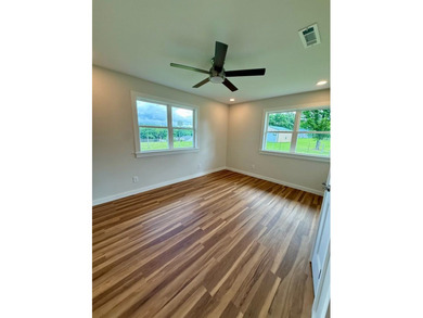 Completely rebuilt & renovated from the studs up, this - photo 15