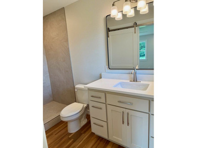 Completely rebuilt & renovated from the studs up, this - photo 17
