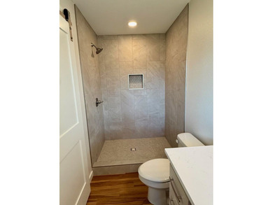 Completely rebuilt & renovated from the studs up, this - photo 18