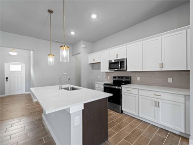 One or more photo(s) has been virtually staged. Tile throughout - photo 11