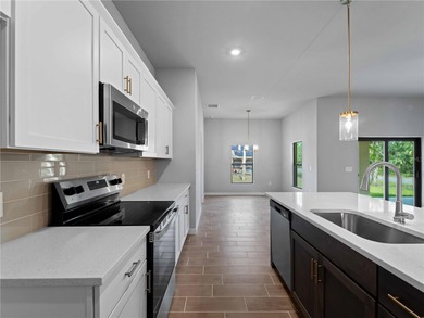 One or more photo(s) has been virtually staged. Tile throughout - photo 14