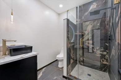Discover modern living in this beautifully designed 4-bedroom, 2 - photo 14