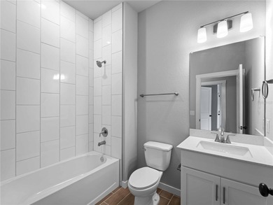 One or more photo(s) has been virtually staged. Tile throughout - photo 39