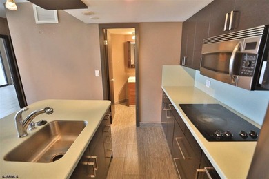 STUNNING!! One bedroom, 1.5 bath unit at the ENCLAVEPLETELY - photo 8