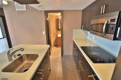 STUNNING!! One bedroom, 1.5 bath unit at the ENCLAVEPLETELY - photo 8