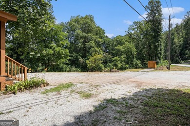 This beautiful log cabin home is located on the edge of the - photo 24