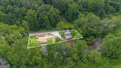 This beautiful log cabin home is located on the edge of the - photo 28