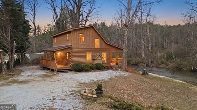 This beautiful log cabin home is located on the edge of the - photo 35