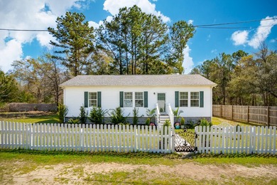 Built in 2018, 5638 Dixie Plantation Road is a lightly lived in - photo 1
